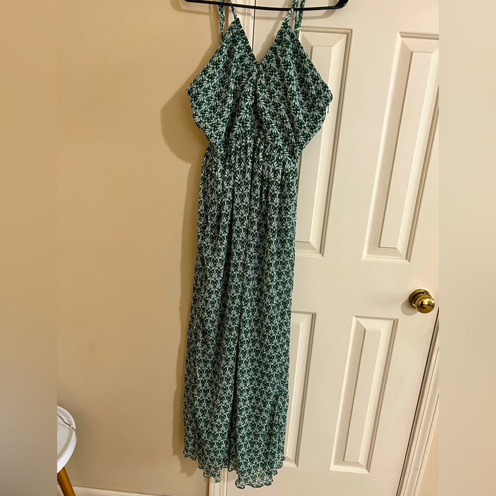 Green and white patterned dress.